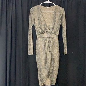 Agaci dress. Skin tight-low cut